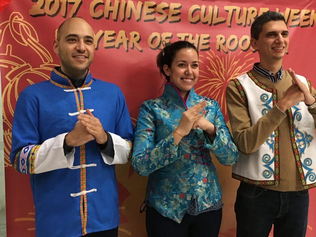 Trying on traditional clothes at Chinese Cultural Week